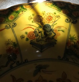 A Chinese famille verte 'Provinces' dish with the arms of France, Kangxi/Yongzheng